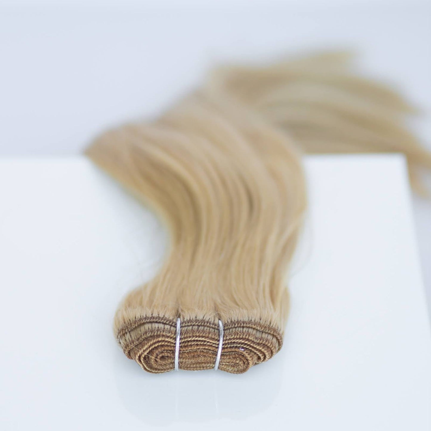 Machine-Tied Weft 28" 180g Pro Blend Hair Extensions - #22 Southern Belle Blonde (aka Light Ash Blonde)